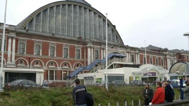 Kensington_Olympia_exhibition_centre_from_station-1200x900-e1646318048230.jpg