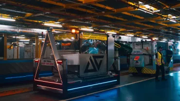 Aurrigo-AutoDolly-and-Auto-DollyTug-in-Baggage-Facility-at-Changi-AIrport-jpg.webp