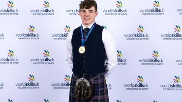 Danny-shows-off-his-SkillELECTRIC-gold-medal-after-winning-in-November-2023_smaller.jpg