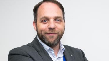 Ian-Mitchell-Headshot-e1734022103628.jpg