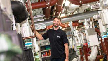 UK-CRE-HVAC-Mechanical-engineer-checking-vent-room-10--scaled.jpg