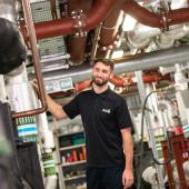 UK-CRE-HVAC-Mechanical-engineer-checking-vent-room-10--scaled.jpg