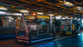 Aurrigo-AutoDolly-and-Auto-DollyTug-in-Baggage-Facility-at-Changi-AIrport-jpg.webp